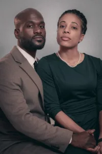 Elegant Couple Portrait in Studio by JG Brasseur Professional studio portrait of a couple in formal attire, showcasing intimate and elegant photography by JG Brasseur.